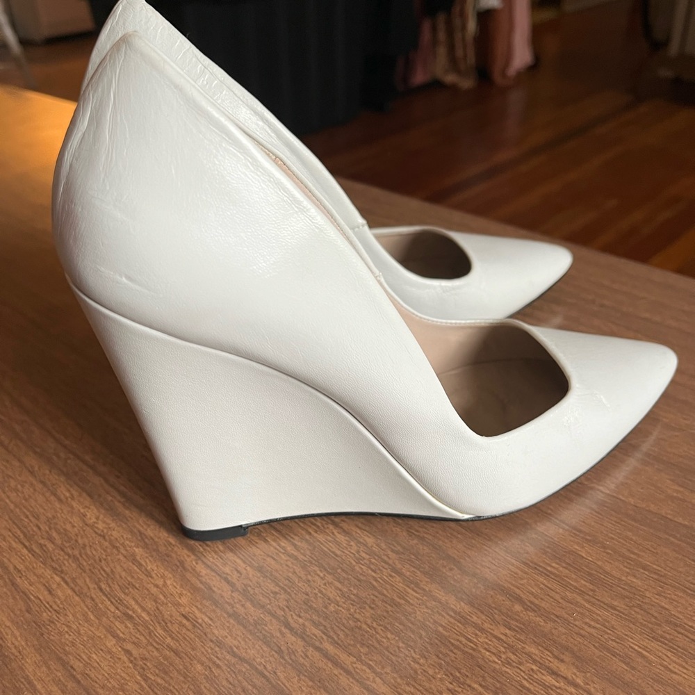 White wedge heel. From 2013